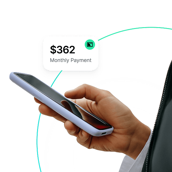 Hand holding phone with financing